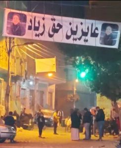 لافتات بشوارع الخانكة تطالب بالقصاص للطفل زياد ضحية مدمني المخدرات - صور