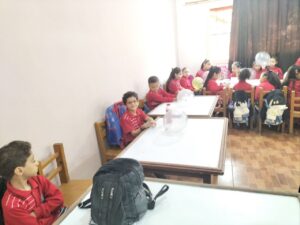 بالبالونات والألعاب شبان بنها تستقبل التلاميذ في أول يوم دراسي