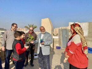 حياتنا بالأخضر..شبان بنها تعلم الطلاب فائدة المساحات الخضراء