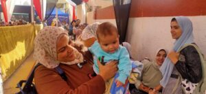 الأمهات بصحبة أطفالهم الرضع يزينون العرس الانتخابي بالقليوبية - صور