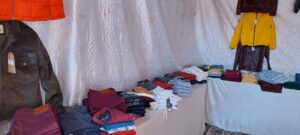 رئيس جامعة بنها يفتتح المعرض الخيري للملابس لطلاب كلية التربية النوعية (صور)