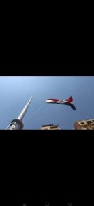المفتي ومحافظ القليوبية يرفعان علم الجمهورية على ساري بأحد حدائق مدينة بنها