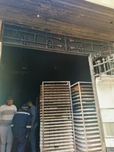 السيطرة على حريق في مصنع حلويات بكفر شكر (صور)