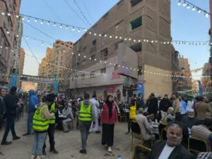 الآلاف من أهالي البكري بشبرا الخيمة ينظمون أكبر مائدة إفطار - صور