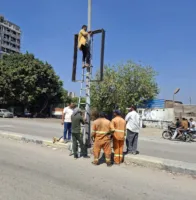 حملة لإزالة الإعلانات المخالفة بطريق الرياح التوفيق ببنها