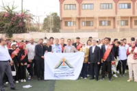 رئيس جامعة بنها يشهد إحتفالية بدء العام الدراسي الجديد والسلام الوطنى بملاعب الجامعة